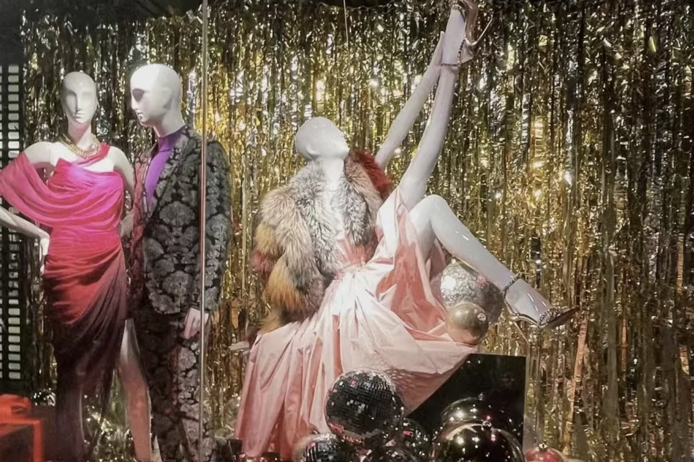Confetti window display with clothes mannequins