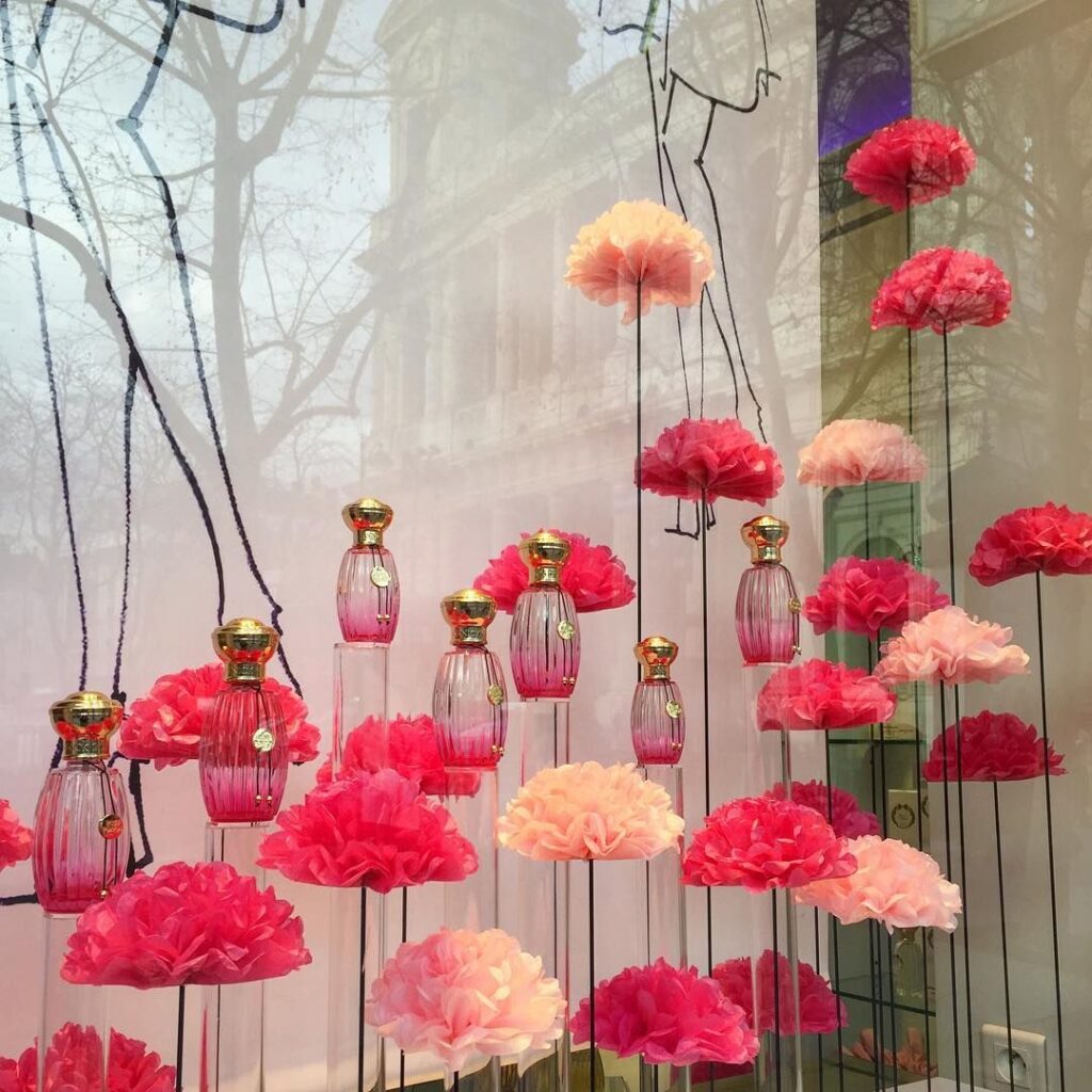 Artificial flower window display for perfume