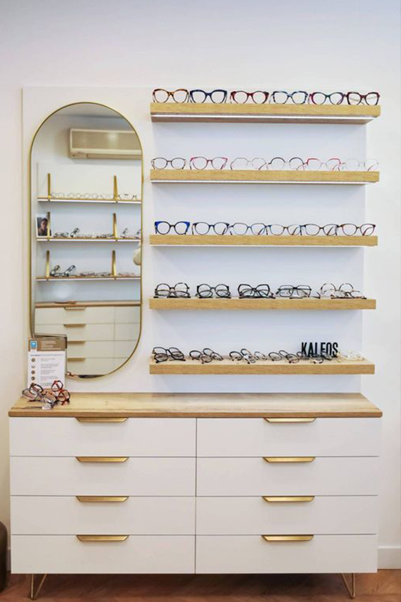 Glasses on the wall shelf display