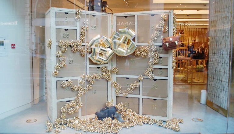 Stacks of gift bows decorate holiday window