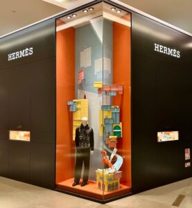 hero prop inside boutique window