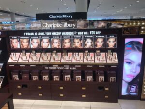 Modular fixture for shop-in-shop retail setup with brand colors and LED lighting