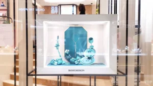 Retail tester display with embedded 10-inch screen for skincare demo