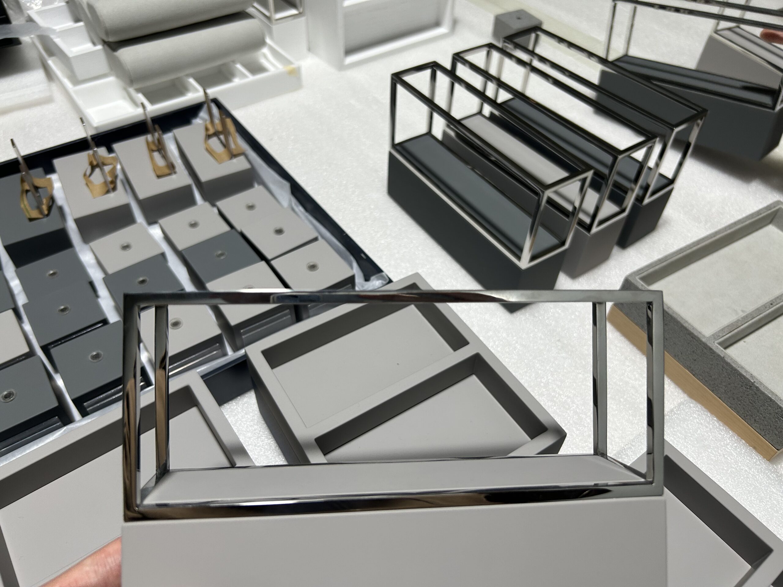 Comparison of textured and glossy surface finishes on retail display fixtures