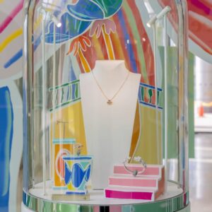 This printed acrylic backdrop features vibrant gradient colors, ideal for retail signage and brand storytelling.