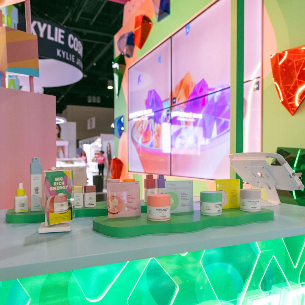 Custom Pantone-colored acrylic logo wall for luxury retail display