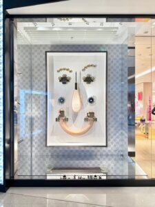 Architectural sculptural display in luxury retail featuring geometric