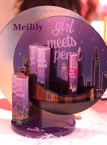 Benefit "Girl Meets Pearl" product display featuring frosted acrylic backdrop and soft-focus lighting for luxury retail storytelling.