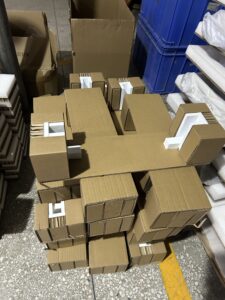 Recyclable packaging surrounding a custom retail POP display with natural finish and eco-labels