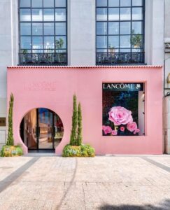 Warm blush and champagne-toned window backdrop for Mother’s Day emotional display