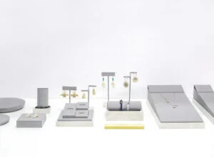 Fabric-covered retail display riser used for jewelry counters