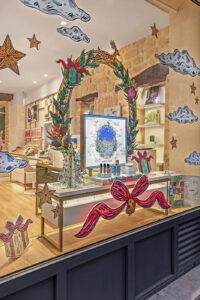 Side-by-side cost comparison of POP display using acrylic, MDF, resin, and metal materials by Samtop