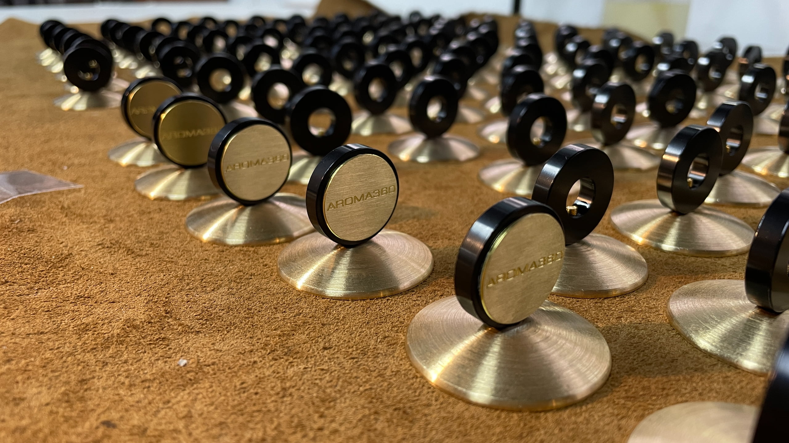 Gold-colored metal decorative frame components with consistent surface finish