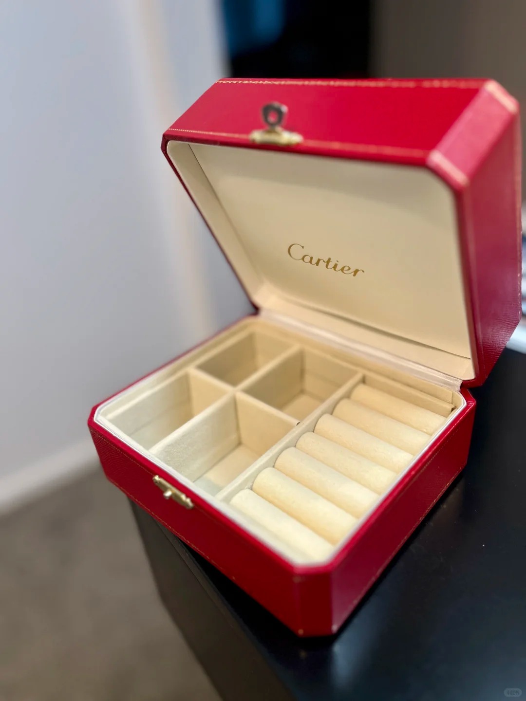 custom luxury watch boxes manufacturing process. Luxury red leather watch and jewelry box with velvet interior compartments and ring slots, designed for premium storage and elegant presentation