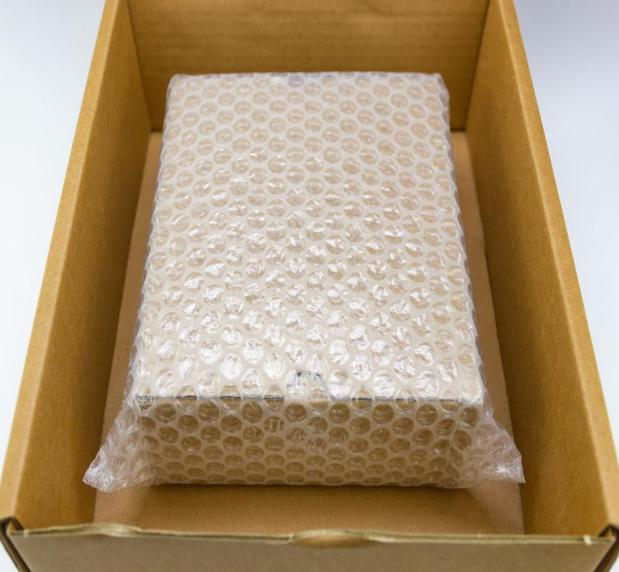 Protective bubble wrap packaging used to prevent damage during shipping of luxury boxes