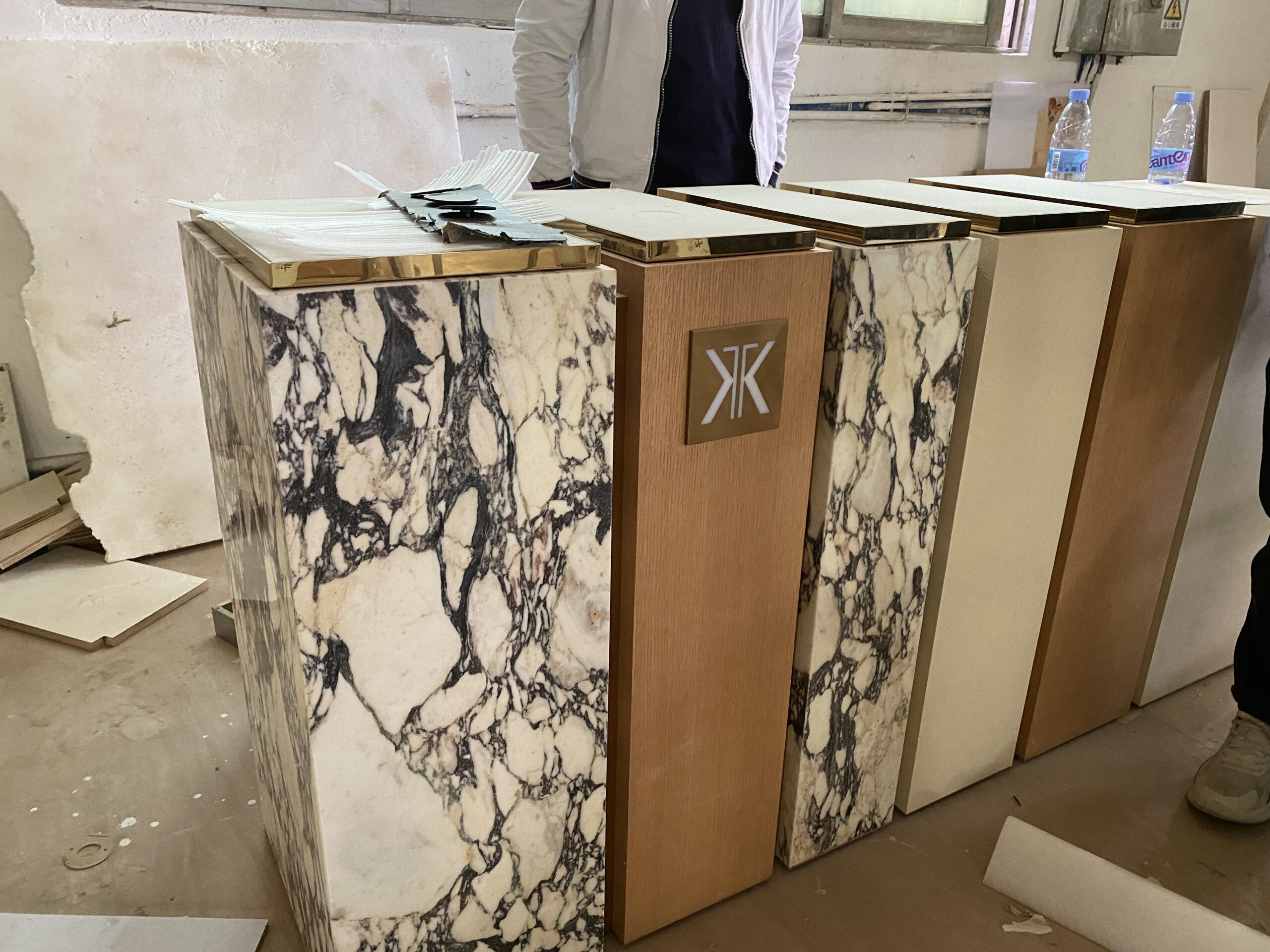Stone panels staged together in the workshop for a vein alignment check.