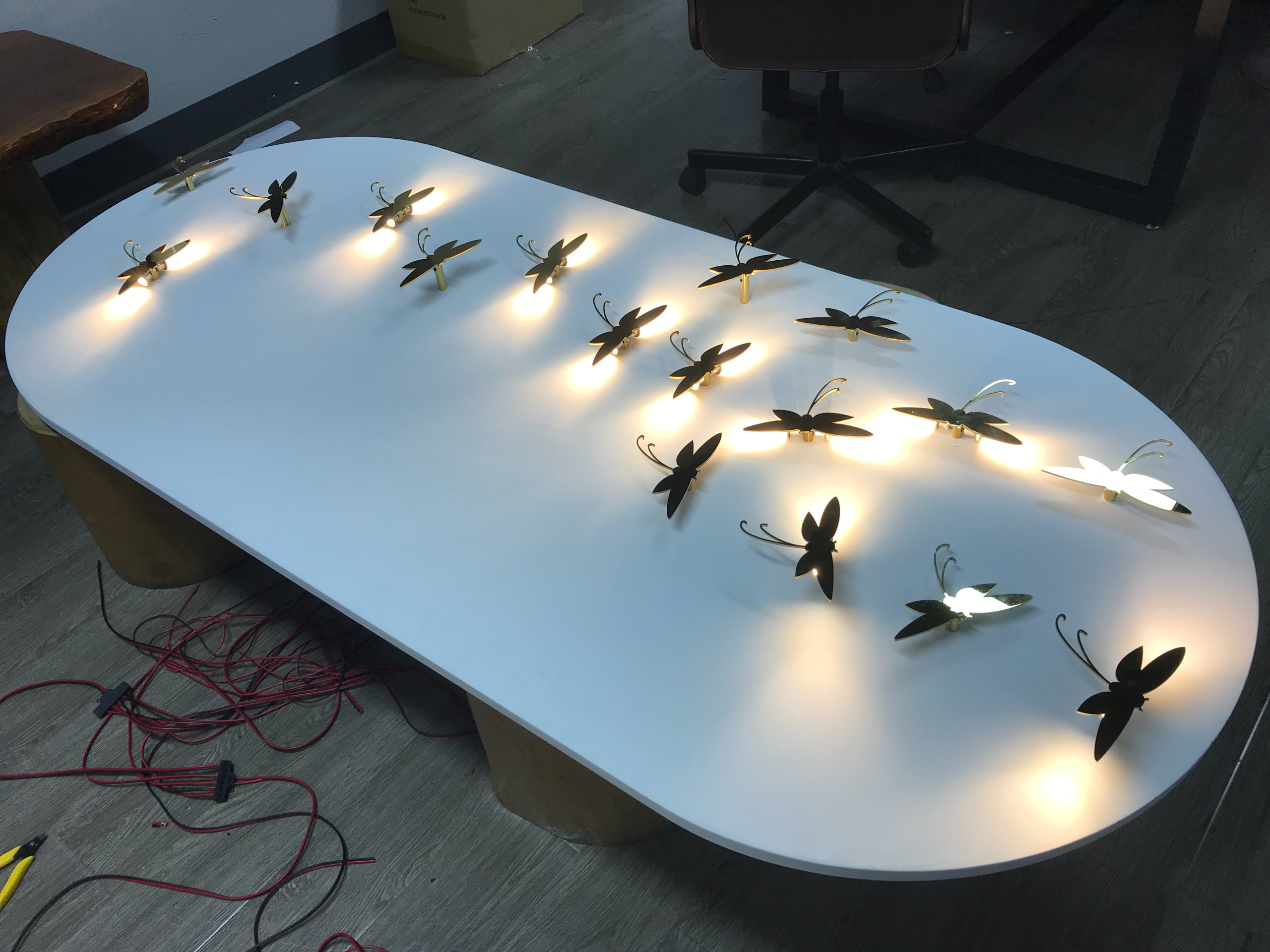 Custom illuminated display props with integrated LED lighting for luxury retail window displays