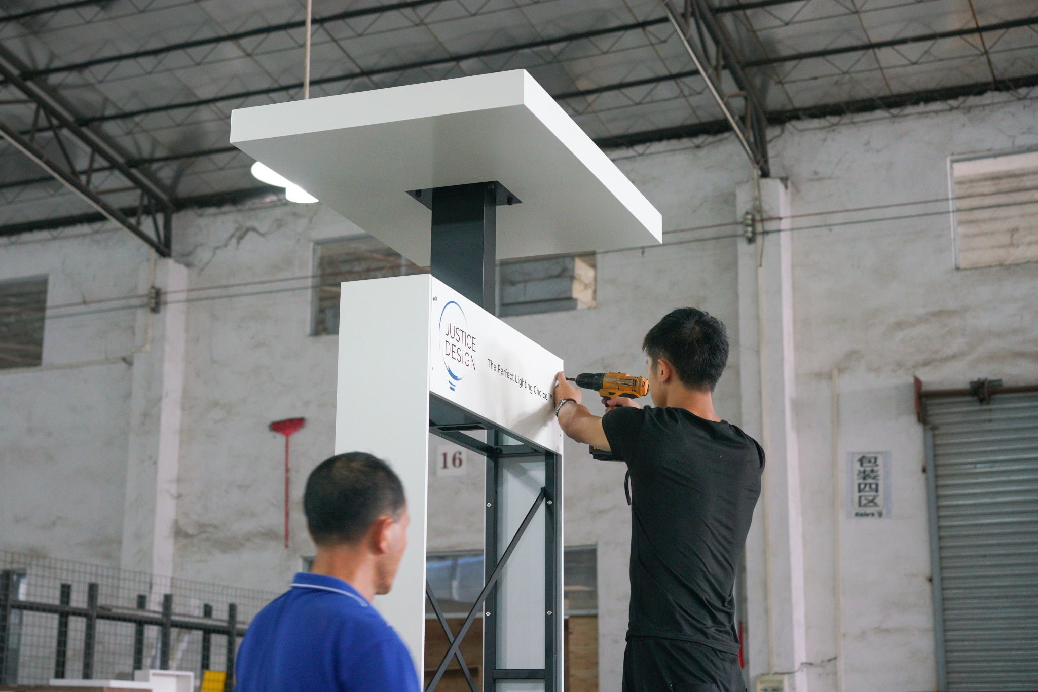 Main structure and canopy assembly of freestanding lighting display in workshop