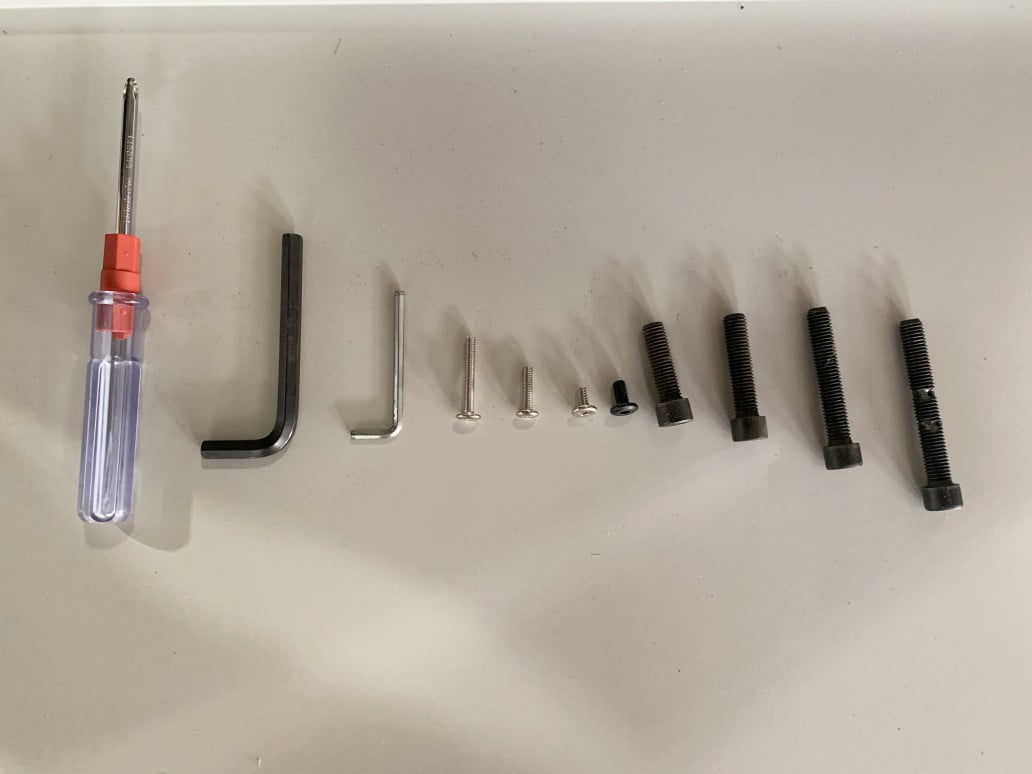 Basic installation tools -- screwdrivers and hex keys prepared for local assembly
